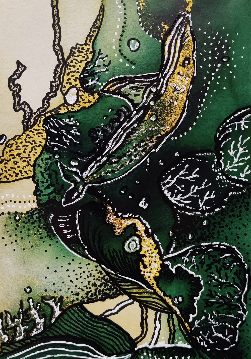 Finished reverse coloring artwork in green and gold